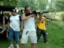 Arch Rival shooting peach with shotgun
