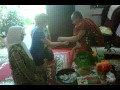 A muslim lady getting a blessing from buddist monk