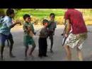 Dan gerts his groove on with the locals