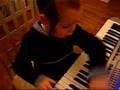HASSIDIC KID PLAYING KEYBOARD 3