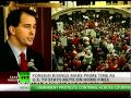 The turbulence in the Arab world has drawn the full attention of the American media. Riots and demonstrations in Libya and Bahrain are dominating the news channels' at primetime, and the newspaper front pages. As Lauren Lyster reports, while US leaders fly the flag for popular uprisings thousands of miles away, it's a very different story at home.