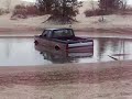 F-150 stuck in a water hole at the Silver Lake Sand Dunes F-150 stuck in a water hole at the Silver Lake Sand Dunes