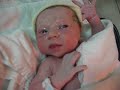 One hour old baby in a nursery