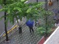 Two younger guys yelling at two older men