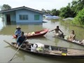 Thailand's flood victims seek refuge