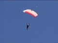 Flying close to mountains and playing with parachutes.