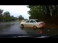 Car Spins Out On Wet Road Crashes Into Oncoming Traffic