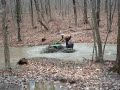 Arctic Cat 700 EFI Mudpro in mudbog