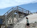 Christian jumps over cross over in Surf City