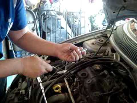 how to change spark plugs for a 2005 dodge neon