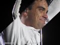 Robbie Williams..his white trackie!