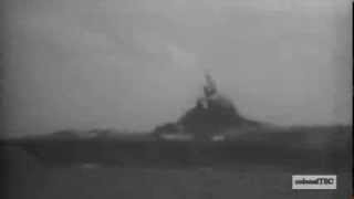 Special attack plane crashing into carrier USS Ticonderoga, 21 Jan 1945. The ship was hit by two planes, this video shows the second plane hitting the island and then cuts to fires that followed the first hit.