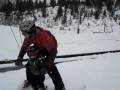 Maddox skiing and Leif Riding up the Magic Carpet.MPG