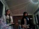 Abbie and Elle doing Guitar Hero - Knights of Cyndonia