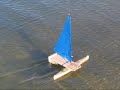 leefoil proa sailing down wind . Wind is blowing 12 to 15 mph coming from behind right side stern quater to proa.
