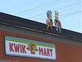 Having previously visited the Kwik-E-Mart (converted 7-Eleven) in Bladensburg, Maryland, this time I took along a video camera.  A line was formed outside the Kwik-E-Mart at the intersection of Olive and Verdugo in Burbank, California, on July 28, the day after the opening of The Simpsons Movie in theatres across the country.