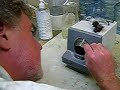Grinding the edges of eyeglass lenses Grinding the edges of eyeglass lenses