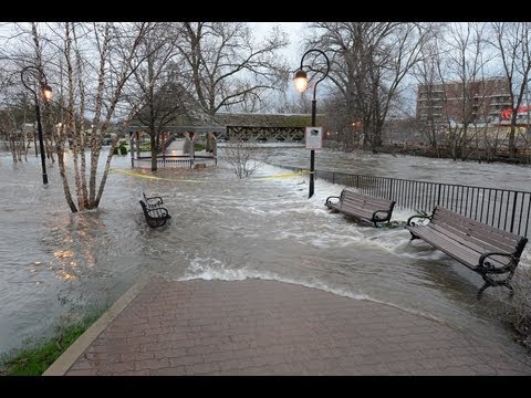 Naperville - After Opening the flood gates at McDowell woods last night 4/18/13 at 6:30 PM the river rose and closed the Washington,Main,Eagle and Jefferson street bridge...