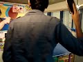 dave playing a ping pong arcade game.