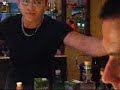 Card tricks at cachaça bar - the bartender entertaining us!!
