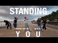 standing next to you