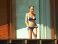 lindsay lohan on holiday in a bikini practising boxing. filmed by papparazzi on the beach outside her hotel.
