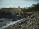 Working and pushing in shit with Komatsu WB 97S backhoe