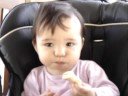 Sabrina eating a toasted sandwich
