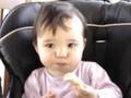 Sabrina eating a toasted sandwich