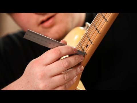 how to measure guitar action