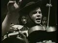 magyarul lsd. lent this clip shows j�nos czinege, csik�s sz�mad�, dancing in front of the hortob�gyi cs�rda inn. it is from a scene in the 1936 film entitled hortob�gy (directed by georg h�llering). at that time czinege was one of the best-known personalities on the hortob�gy plain, and is vividly remembered to this day by old herdsmen from the area. in the film he plays himself, and calls for the band to play his favourite song: i'll call out as i go down the street in nagyiv�n... and according to the stories about him, it is true that whenever he entered the hortob�gyi inn, the band would immediately start to play his favourite song.

his hat was characteristically round in shape, and he wore it pulled down over his eyes.

the name of the other (younger) csik�s is mih�ly nagy.

tune: 
vendel papp has no nose...
i'll call out as i go down the street in nagyiv�n...
