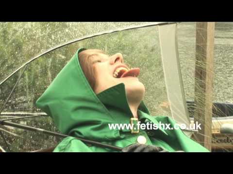 mackintoshes - Susie wears her green satin cape over her black satin mackintosh with rubber skirt and rubber gloves to finish off the look what more could you ask for? the ...