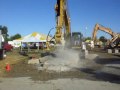 CAT 324DL with road header