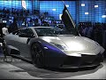 please rate and/or comment. thanks...
check out my other video *lamborghini through the years (1972-2008)* 

listen, everyone! i know the music choice isnt the best, that's because someone mixed up my music files and i put the wrong music in after stronger, none of that was intended to be in the video, my friend thought it would be funny. i never re-checked the video becuase i thought the music that i intended to put in was playing until i watched the video myself when views began to go up. i'm sorry but there's nothing i can do about it now so here's what i have to say about the issue:

if you don't like the music, turn the volume off!!! 

lamborghini reventon technical data:

frame 
high strength tubular steel structure with carbon fibre components. 
bodywork
in carbon fibre, except roof and door external panels (steel) 
steering
type mechanical (rack and pinion) power-assisted
right-hand turning circle 12.55 m (41.17 ft)
wheels and tyres
front 245/35 zr 18
rear 335/30 zr 18
engine
type 12 cylinders at 60�
bore and stroke 88 mm x 89 mm (3.46 in x 3.50 in) 
displacement 6496 cc (396.41 in3) 
compression ratio  0.2):1?(11 
maximum power 650 hp (478 kw) at 8000 rpm (guaranteed through the engine selection) 
maximum torque 660 nm (487 lb-ft) at 6000 rpm
engine position in vehicle longitudinal central-rear 
cylinder heads and engine block aluminium
intake system variable geometry with 3 operating modes 
timing
4 valves per cylinder, 4 overhead camshafts 
timing gear transmission 2 chains
continuous timing variator (int. and ex.) electronically controlled 
ignition system
static type ignition system with individual coils (one for each spark plug). 
firing sequence 1-7-4-10-2-8-6-12-3-9-5-11
fuel system/injection
lamborghini lie electronic engine control unit, multipoint, sequential timed, drive by wire 
lubrication system
type dry sump
recovery pumps 2 gear pumps
delivery pump (high pressure) 1 gear pump
cooling system
type liquid cooled, with pressurized circuit 
transmission
type of transmission permanent all-wheel drive with viscous traction system
gearbox 6-speed mechanical gearbox
clutch dry single disc
clutch disc diameter 272 mm (10.7 in)
transmission ratios
gearbox: 
ist 1:3.091
iind 1:2.105
iiird 1:1.565
ivth 1:1.241
vth 1:1.065
vith 1:0.939
reverse 1:2.692
brakes
4 self-ventilated rotors with pedal control, hydraulic transmission with dual independent circuits, one for each axle with vacuum servo. 
abs antilock device + drp function. 
steel brake lines
front rotor � 380 x 34 mm (14.96 in x 1.34 in) 
front calliper cylinders n. 8 (32-28 mm/32-28 mm) 
(1.26 in-1.10 in/1.26 in-1.10 in) 
rear rotor � 355 x 32 mm (13.98 in x 1.26 in) 
rear calliper cylinders n. 4 (40-44 mm) 
(1.57 in-1.73 in) 
ceramic rotors system (optional) 
front rotor � 380 x 38 mm (� 14.96 in x 1.5 in) 
front calliper cylinders n. 6 (32-36-38 mm) (1.26 in-1.42 in-1.5in) 
rear rotor � 380 x 38 mm (� 14.96 in x 1.5 in) 
rear calliper cylinders n. 6 (32-36-38 mm) (1.26 in-1.42 in-1.5in) 
handbrake mechanical, acting on rear wheels 
suspension
4-wheel independent articulated quadrilateral system. hydraulic shock absorbers and coaxial coil springs. suspension with dual front and rear struts, antiroll, antidive and antisquat bar. 
performance data
top speed 340 km/h (211.3 mph) 
acceleration 0-100 km/h (0-62 mph) 3.4 s (before: 3.8 s) 
dimensions
wheelbase 2665 mm (104.92 in) 
total length 4700 mm (185.04 in) 
total width 2058 mm (81.02 in) 
total height 1135 mm (44.69 in) 
dry weight (no fuel and no liquids) 1665 kg (3670.7 lb) 
front trackwidth 1635 mm (64.37 in) 
rear trackwidth 1695 mm (66.73 in) front overhang 1080 mm (42.52 in) 
rear overhang 955 mm (37.60 in) 
maximum overall width with external rear-view mirrors 2215 mm (87.20 in) 
liquid capacities (litres) 
engine oil 12 litres (3.17 gal) 
gearbox oil 3.5 litres (0.92 gal) 
front differential oil 1 litre (0.26 gal) 
rear differential oil 2.5 litres (0.66 gal) 
cooling circuit 15 litres (3.96 gal) 
consumption (according to dir 1999/100/ce) 
urban 32,3 l/100km
extra-urban 15,0 l/100 km
combined 21,3 l/100 km
co2 emissions 495 g/km
*pictures not taken by me*
*created by pimpedoutrides7293*