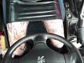 Driving in latex and high heeled boots