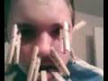 videos de Ross stanley sticks pegs on his face