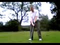 jim playing golf