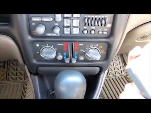 how to remove a cd player from a pontiac grand am