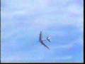 Boeing company 707 dash 80 completes a barrel roll during early flight testing to show the aircrafts abilities