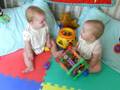 Baby twins in conversation