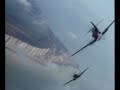 footage of 2 spitfires and 2 which i think are me 109s having a dogfight over dover
