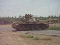 T-55 firing DSHK