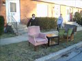 Lance Junting over a pink chair