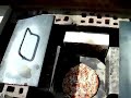 Putting pizza into pizza tandoor oven Putting pizza into pizza tandoor oven