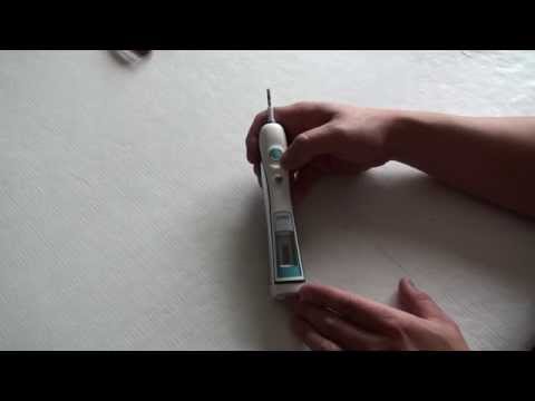 how to remove head from oral b toothbrush