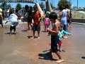 Josie in a sprinkler