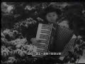 Germania.Un bambino virtuoso della fisarmonica.1938 Germania.Un bambino virtuoso della fisarmonica.1938
