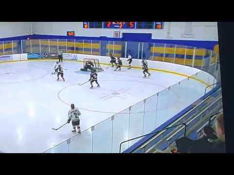 Chase Foy #14 with the 2nd assist against Shattuck St. Mary’s