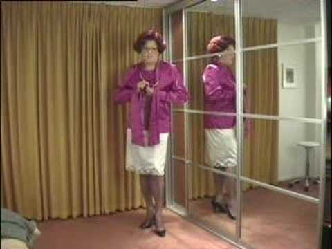 wandanylon - Mrs. Wanda Nylon undressing her purple blouse and skirt, up to her white girdle and nylons.