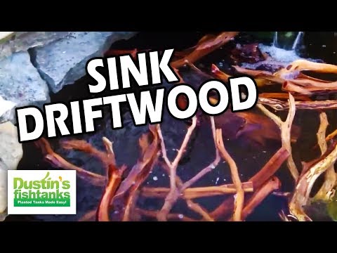 how to get wood to sink in aquarium